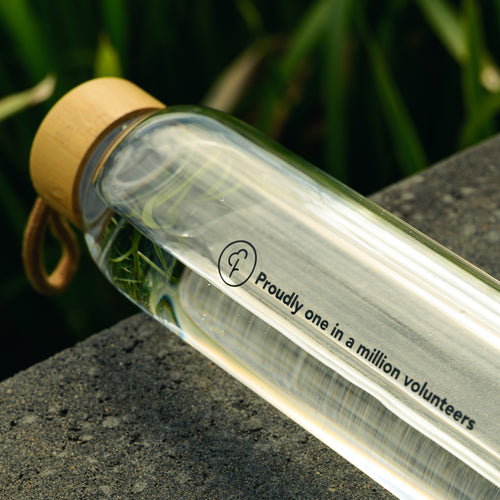 Limited Edition 'Proudly one in a million volunteers' Glass Water Bottle