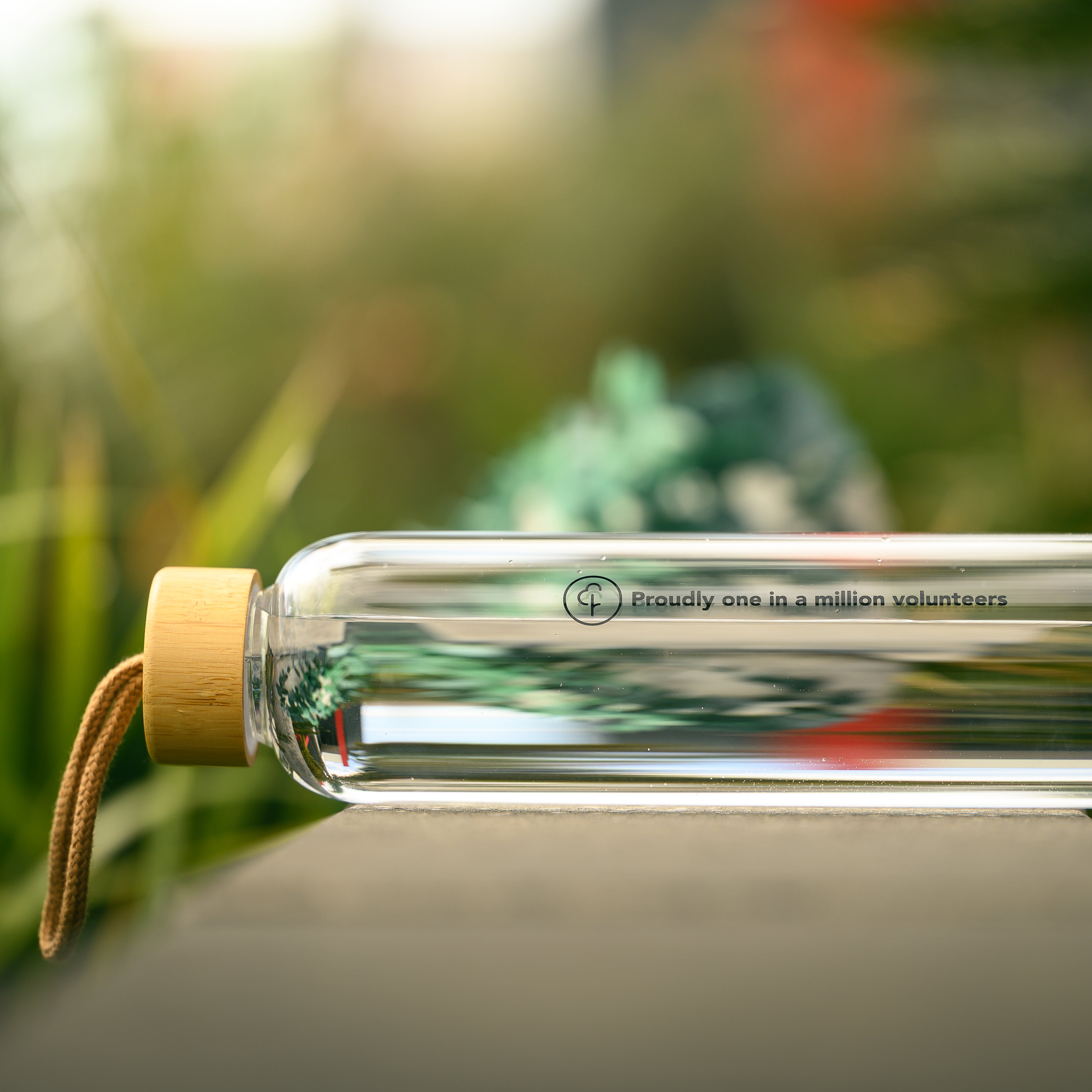 Limited Edition 'Proudly one in a million volunteers' Glass Water Bottle